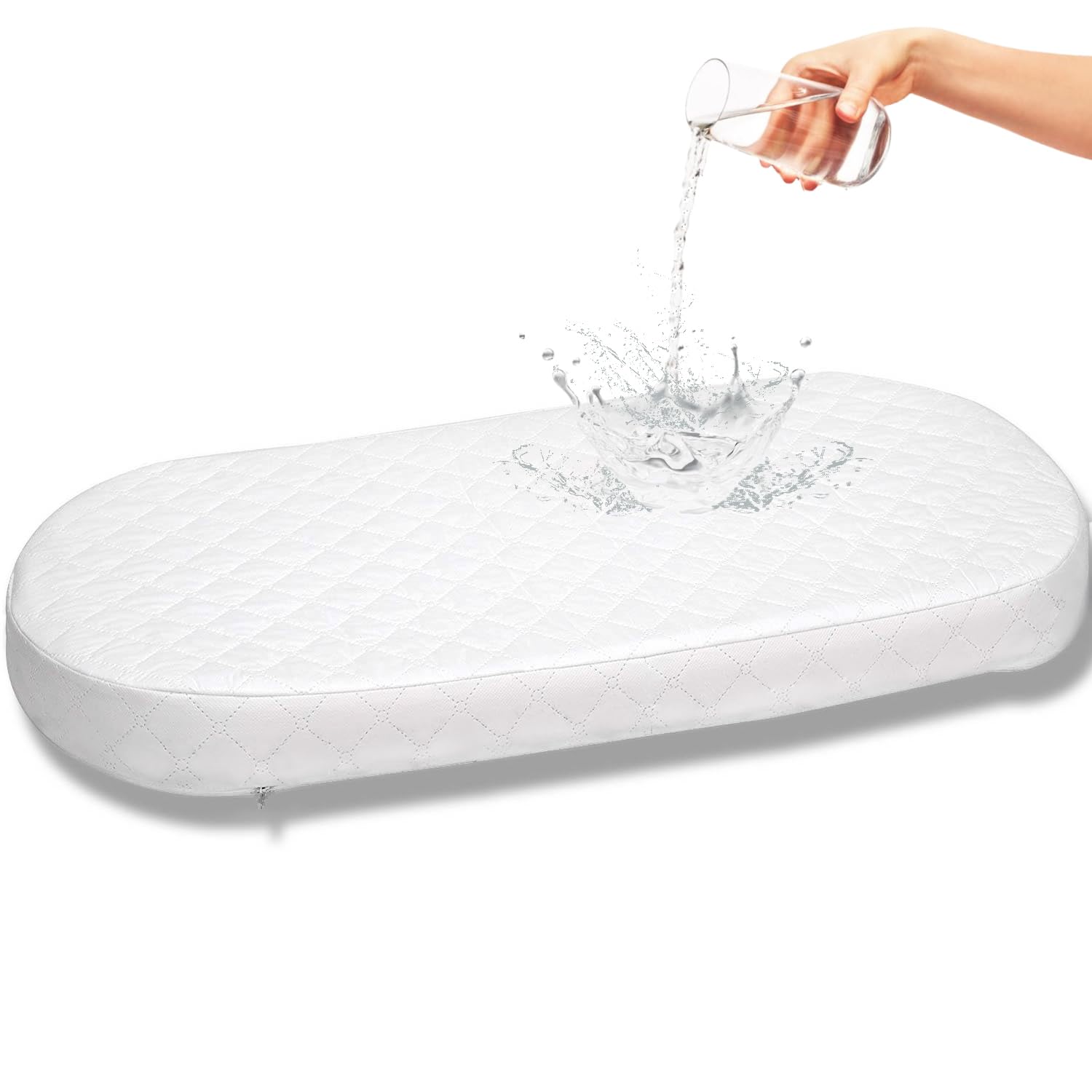First Essentials bassinet mattress pad front view demonstrates oval 15x30 shape for newborn comfort.