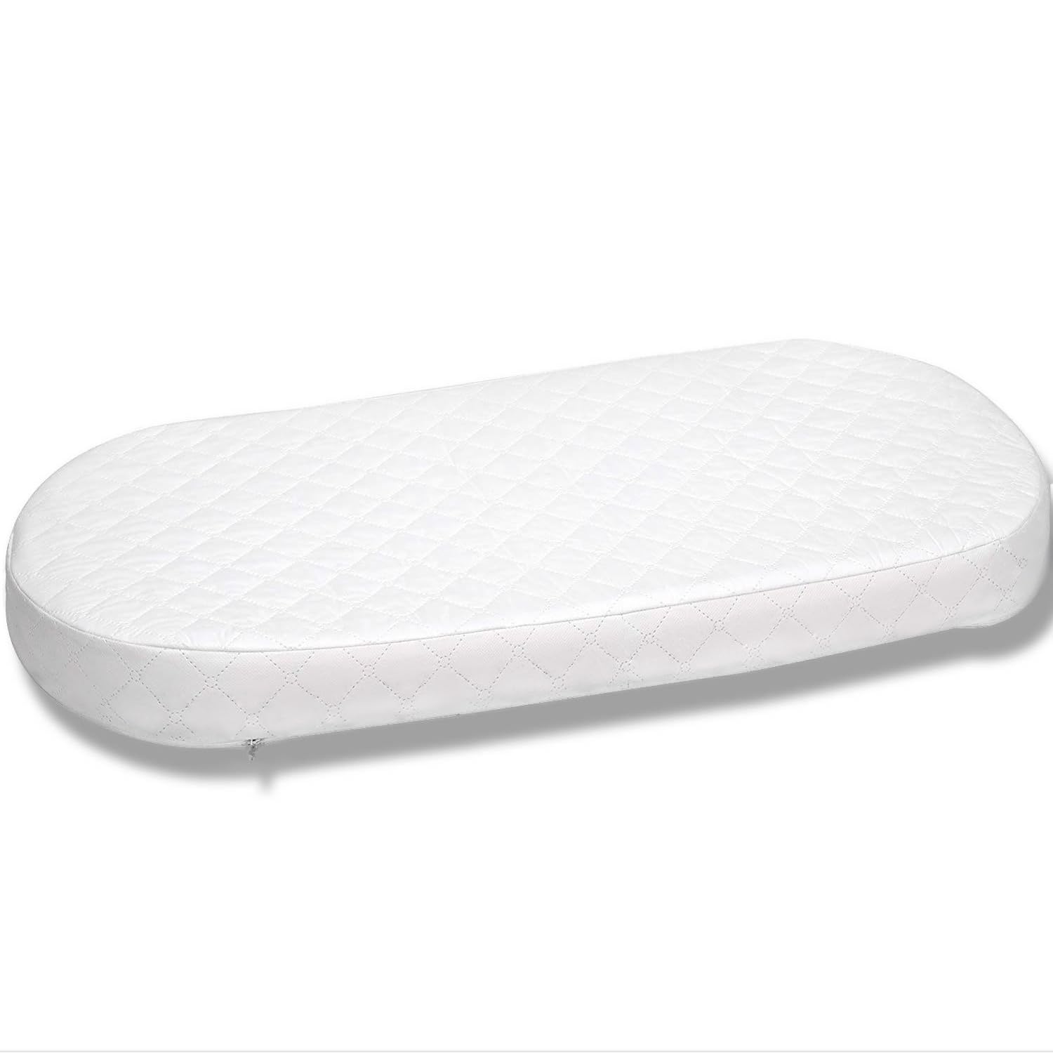 First Essentials bassinet mattress pad side view shows height for secure sleep.