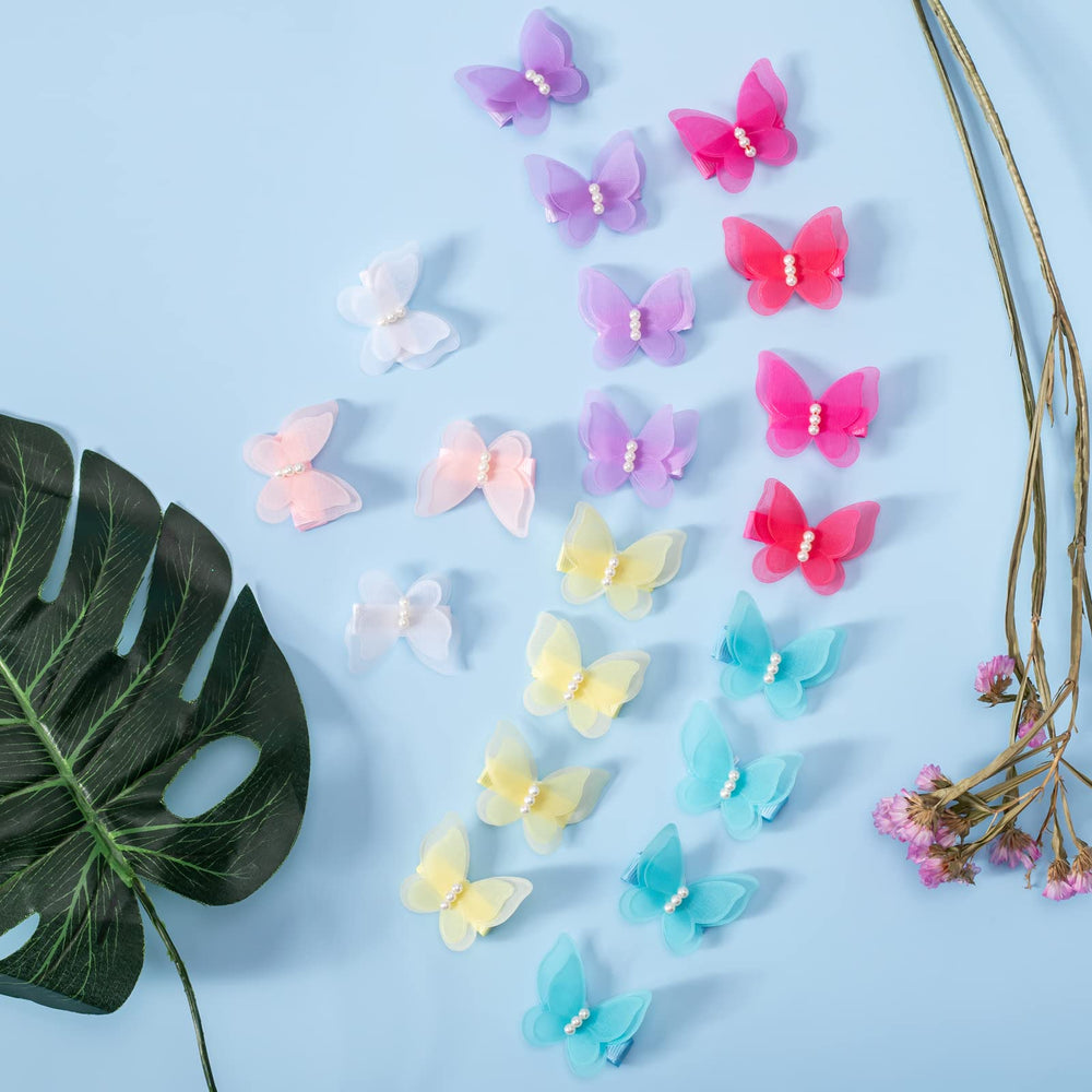 Fishdown 3D butterfly wing clip in rose-pink offers secure all-day wear.