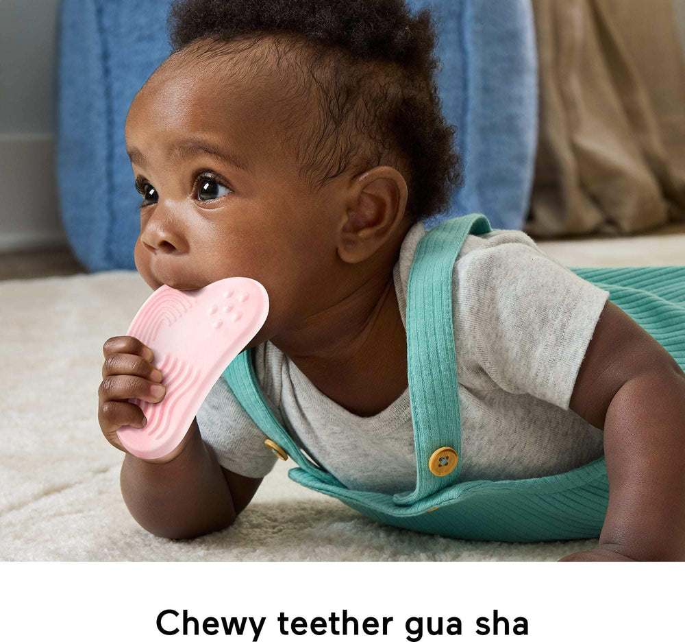 Fisher-Price crinkle face mask creates soft sounds and textured exploration.