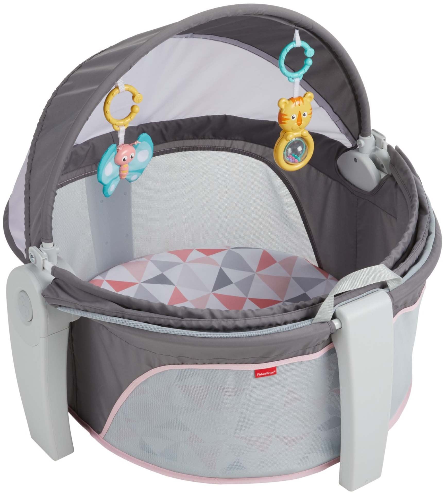 Fisher-Price dome handles enable quick grab-and-go setup.