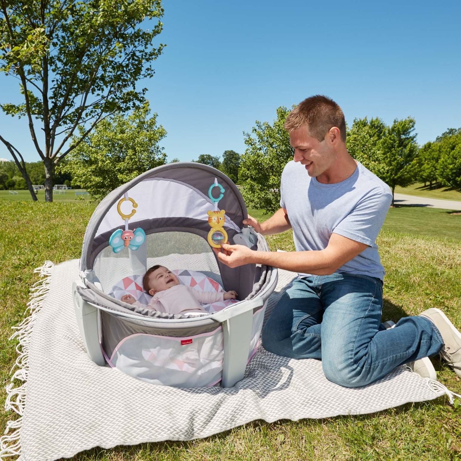 Fisher-Price travel space for indoors and outdoors keeps baby comfortable.