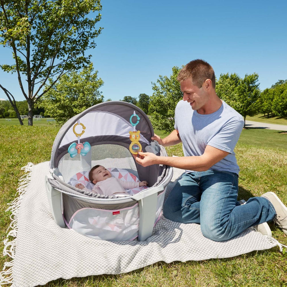 Fisher-Price travel space for indoors and outdoors keeps baby comfortable.