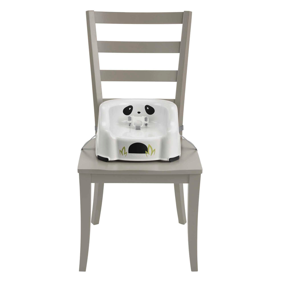 Fisher-Price Panda booster seat attaches to chair with straps for quick setup