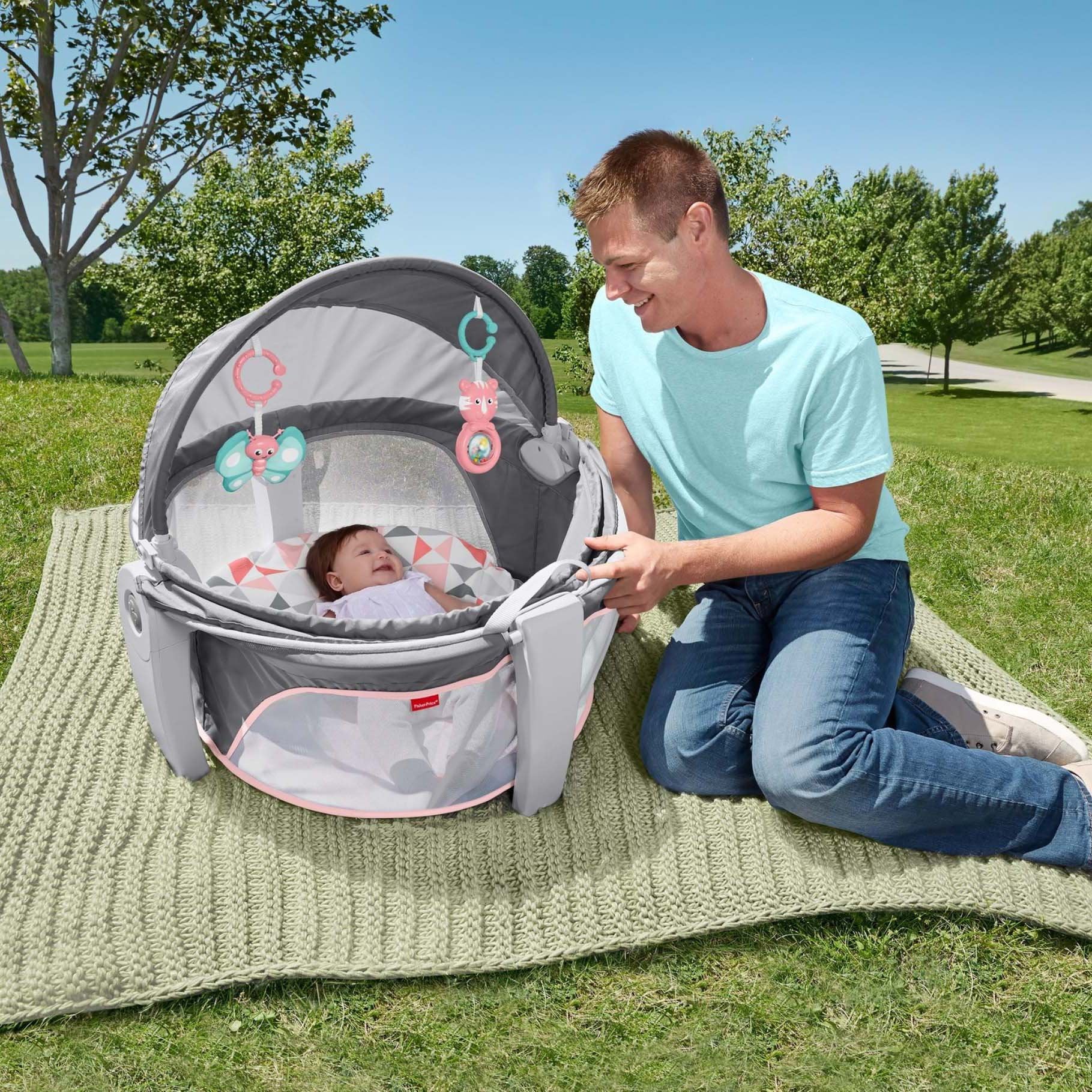 Fisher-Price portable bassinet dome canopy UPF 20 shields sun and bugs.