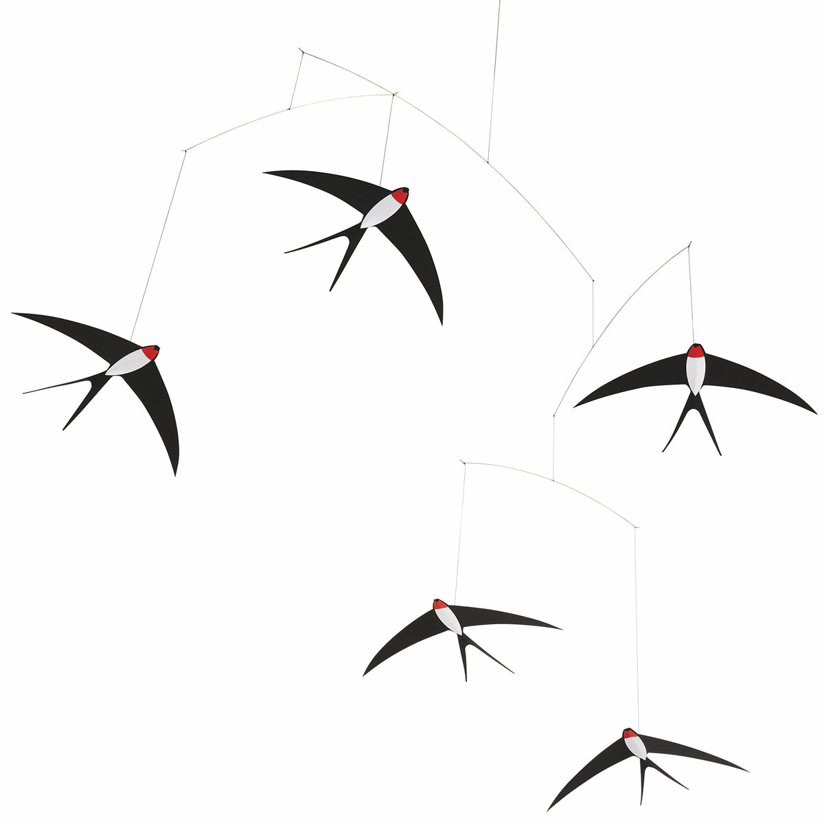 Flensted 5 swallows mobile hanging over bed for calming ambience.