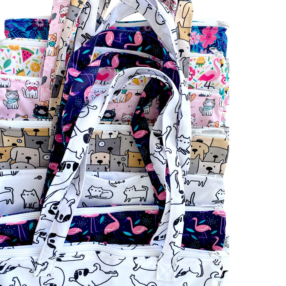 FLOCK THREE travel scenario bag in use at poolside.