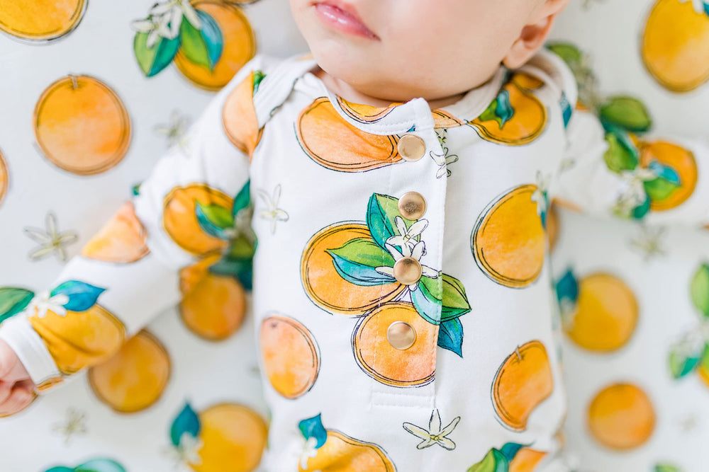 Florida Kid Co. Orange Blossom cover is machine washable for easy laundry days.