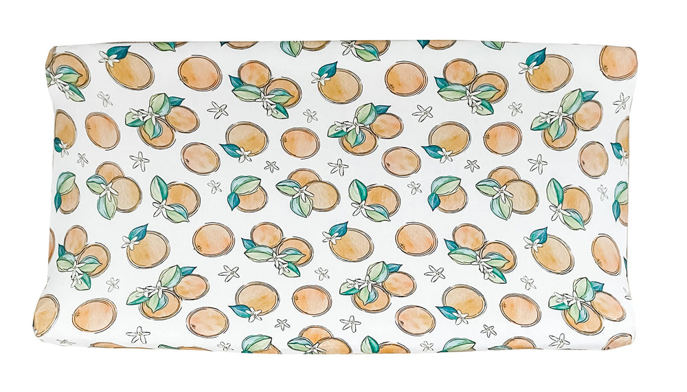 Florida Kid Co. Orange Blossom fitted cover shows soft viscose-bamboo fabric for baby comfort.