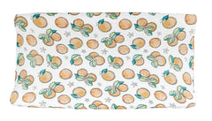 Florida Kid Co. Orange Blossom fitted cover shows soft viscose-bamboo fabric for baby comfort.