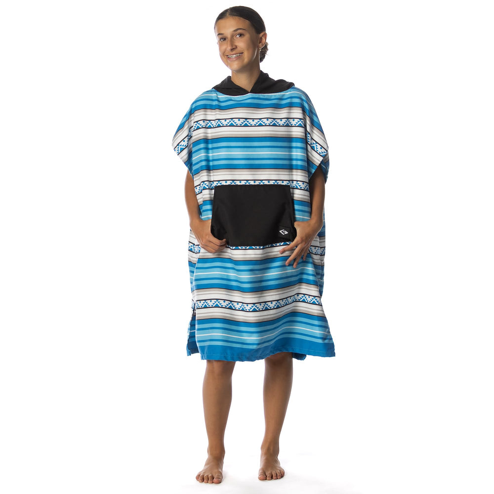 Flow Changing Poncho for Kids Laguna Blue child wearing it after swim