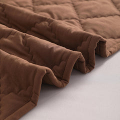 FLXXIE coffee quilted detail closeup, breathable microfiber and durable stitching.