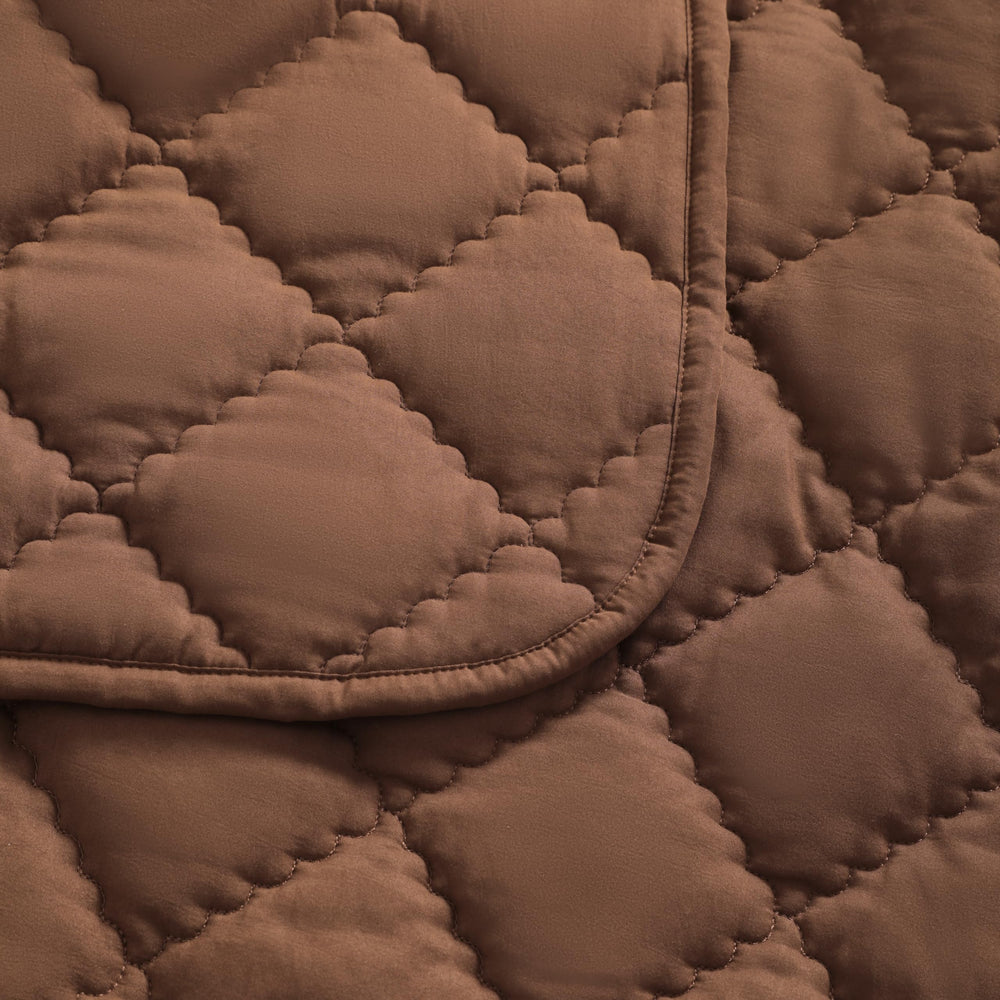 FLXXIE coffee toddler comforter in stroller, soft warmth on the go.