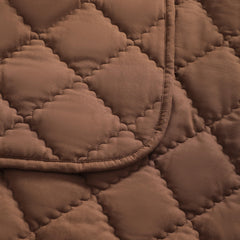 FLXXIE coffee toddler comforter in stroller, soft warmth on the go.