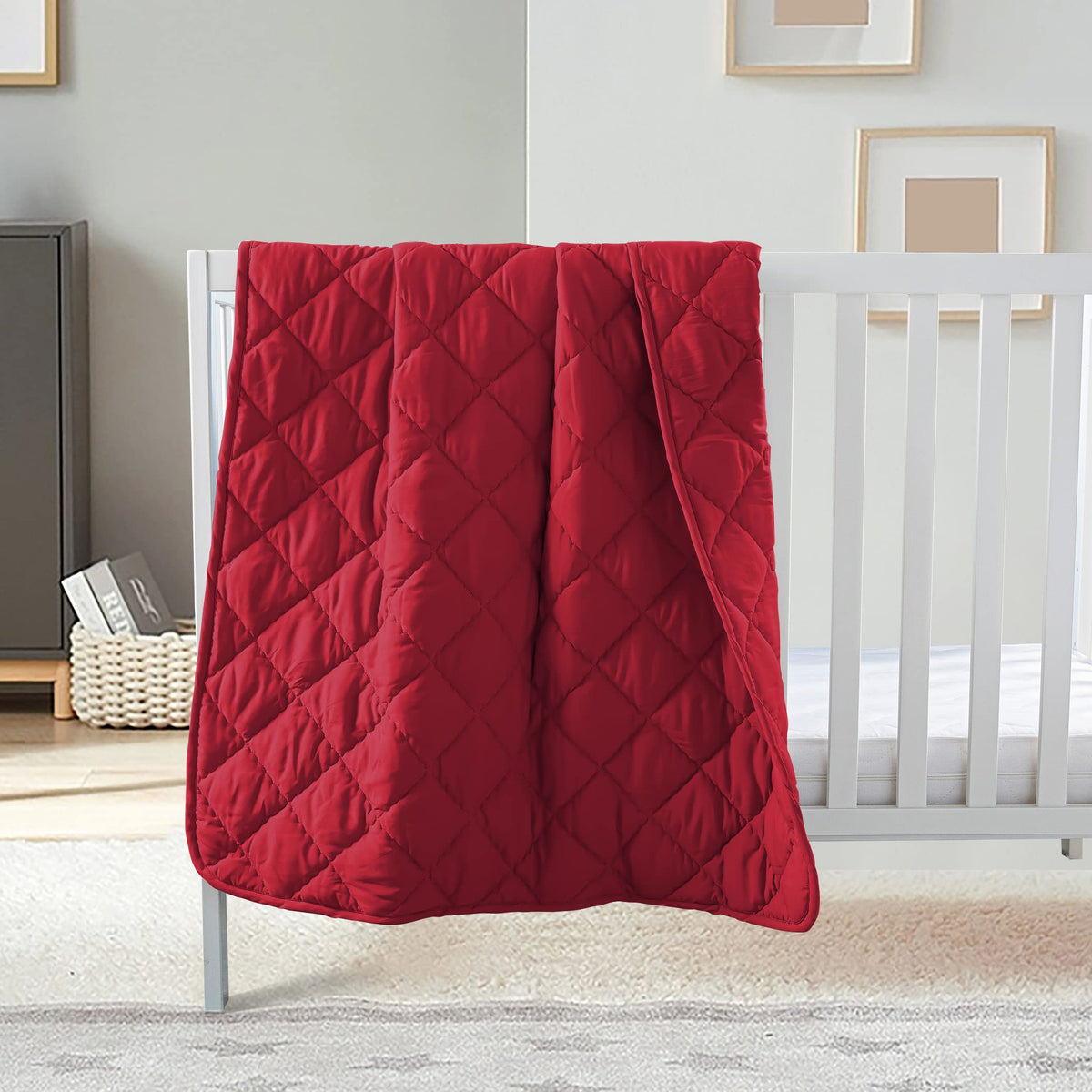 FLXXIE comforter in red color for cozy crib and stroller use.