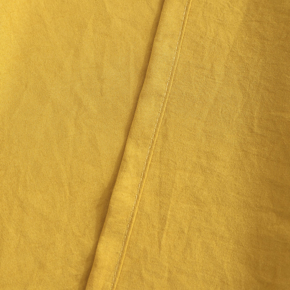 FLXXIE kids room setup demonstrates versatile yellow bedding for any theme