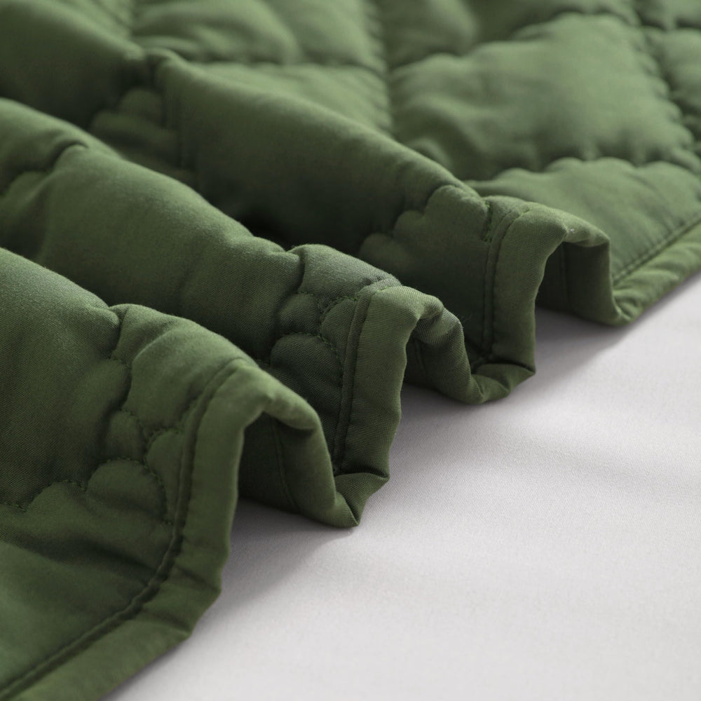 FLXXIE lightweight blanket in stroller demonstrates easy mobility and warmth without bulk
