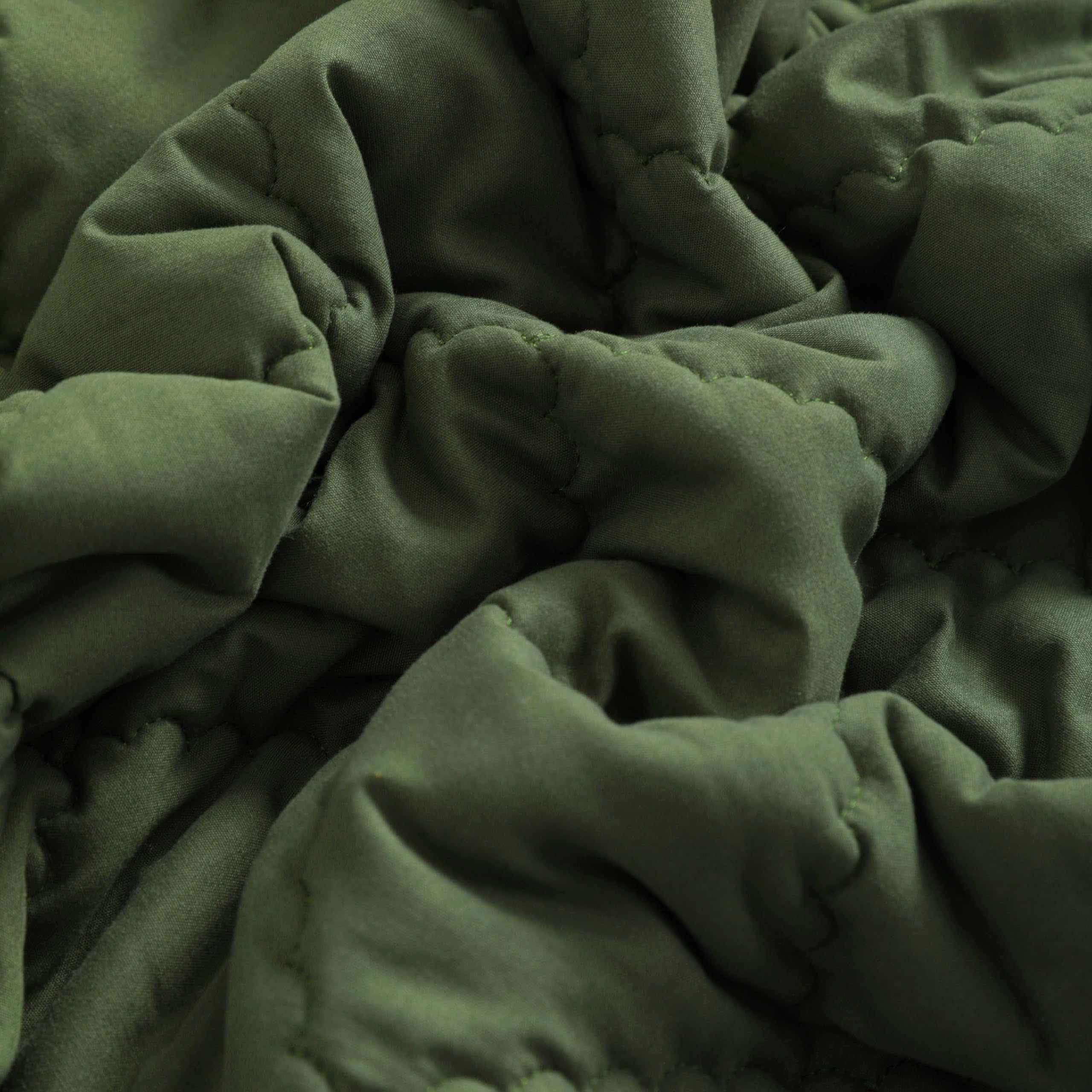 FLXXIE olive comforter spread on crib or bed for cozy, decorative styling