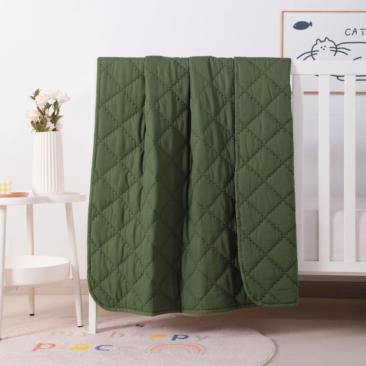 FLXXIE olive toddler comforter folded for easy storage and travel