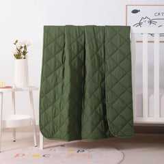 FLXXIE olive toddler comforter folded for easy storage and travel