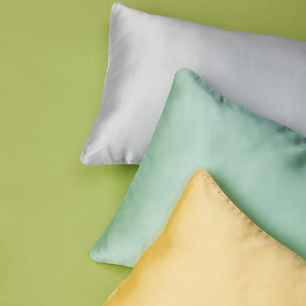 FLXXIE pillowcase on bed lifestyle shot emphasizes versatile color and style.
