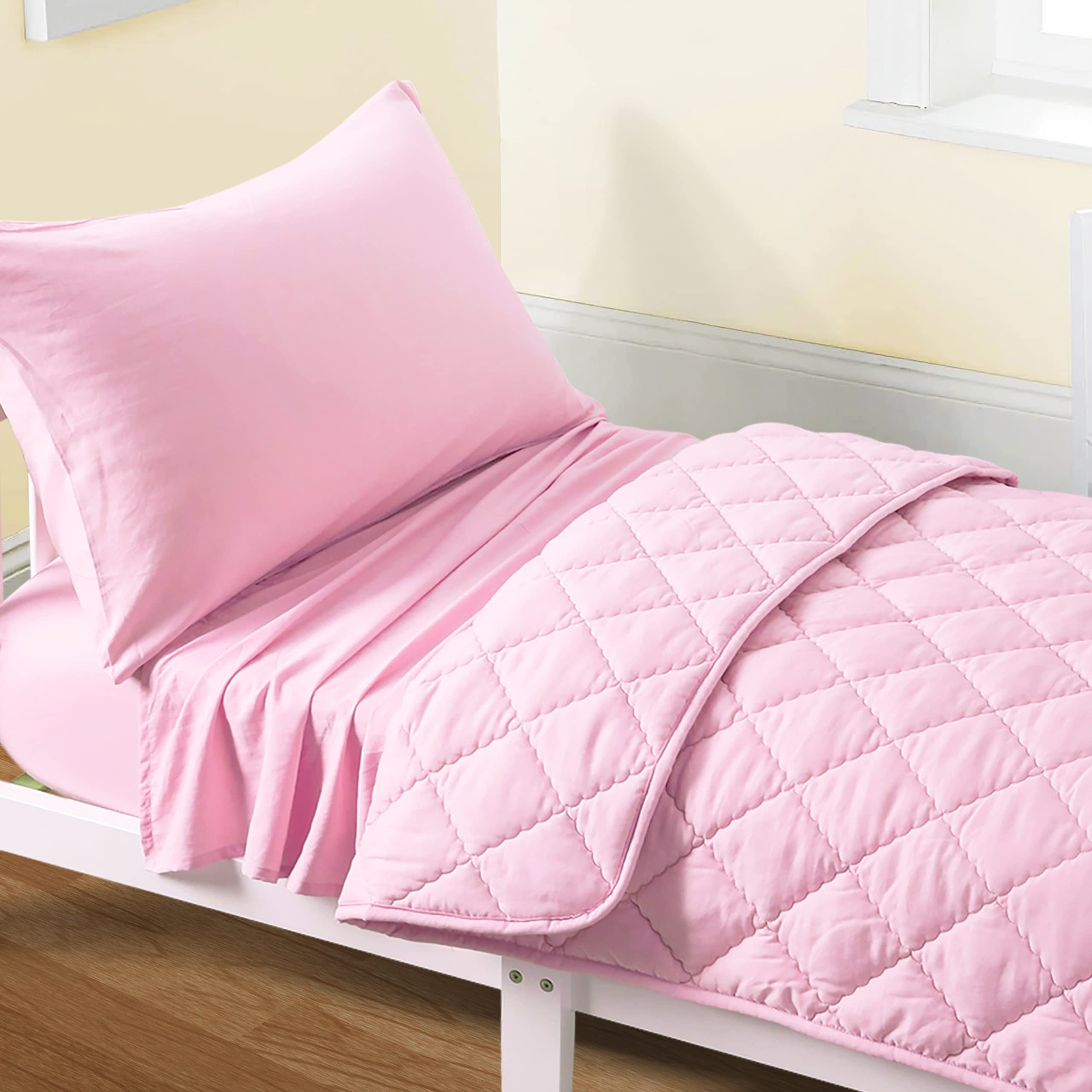 FLXXIE toddler bedding set front view in pink showing complete 4-piece set for a cozy look