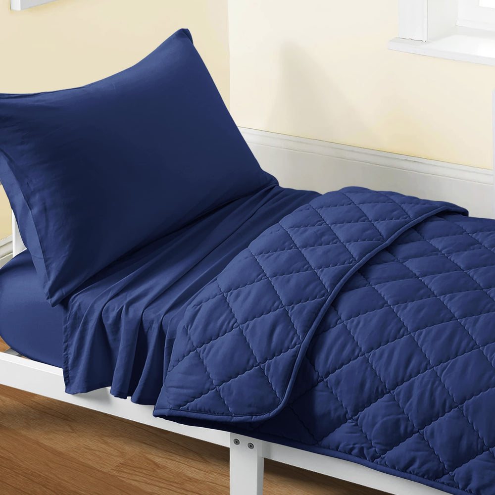 FLXXIE toddler bedding set navy blue packaging view highlights gifting-ready presentation