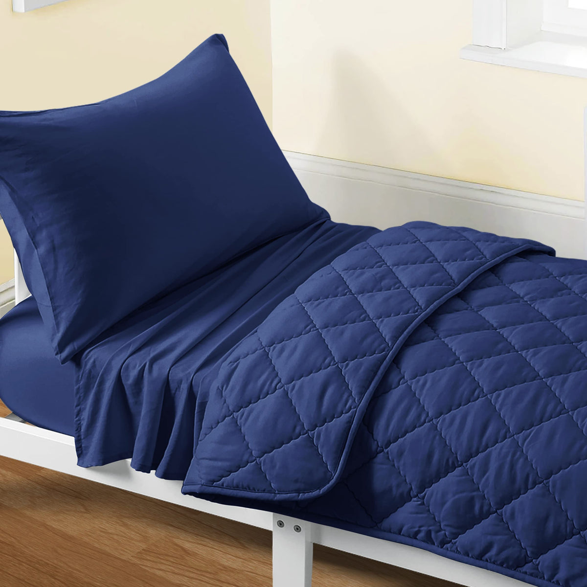 FLXXIE toddler bedding set navy blue packaging view highlights gifting-ready presentation