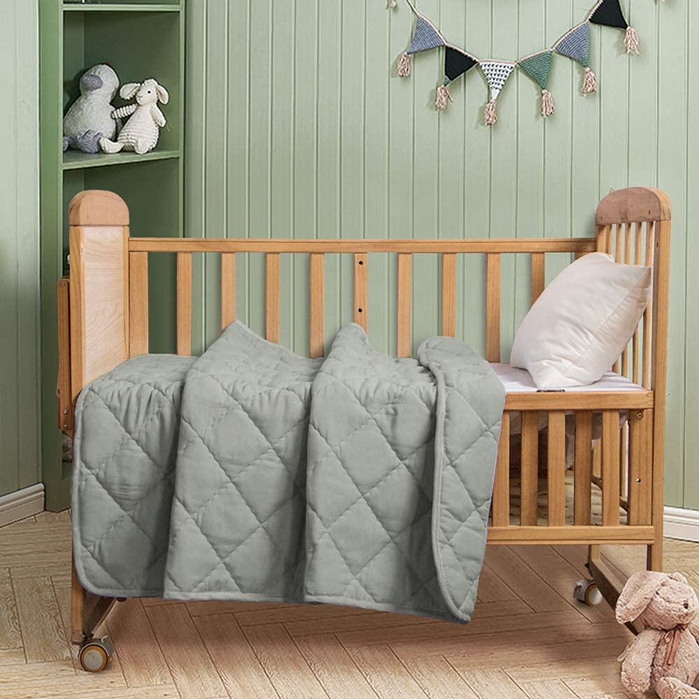 FLXXIE comforter secures in strollers and travel setups for on-the-go coziness.