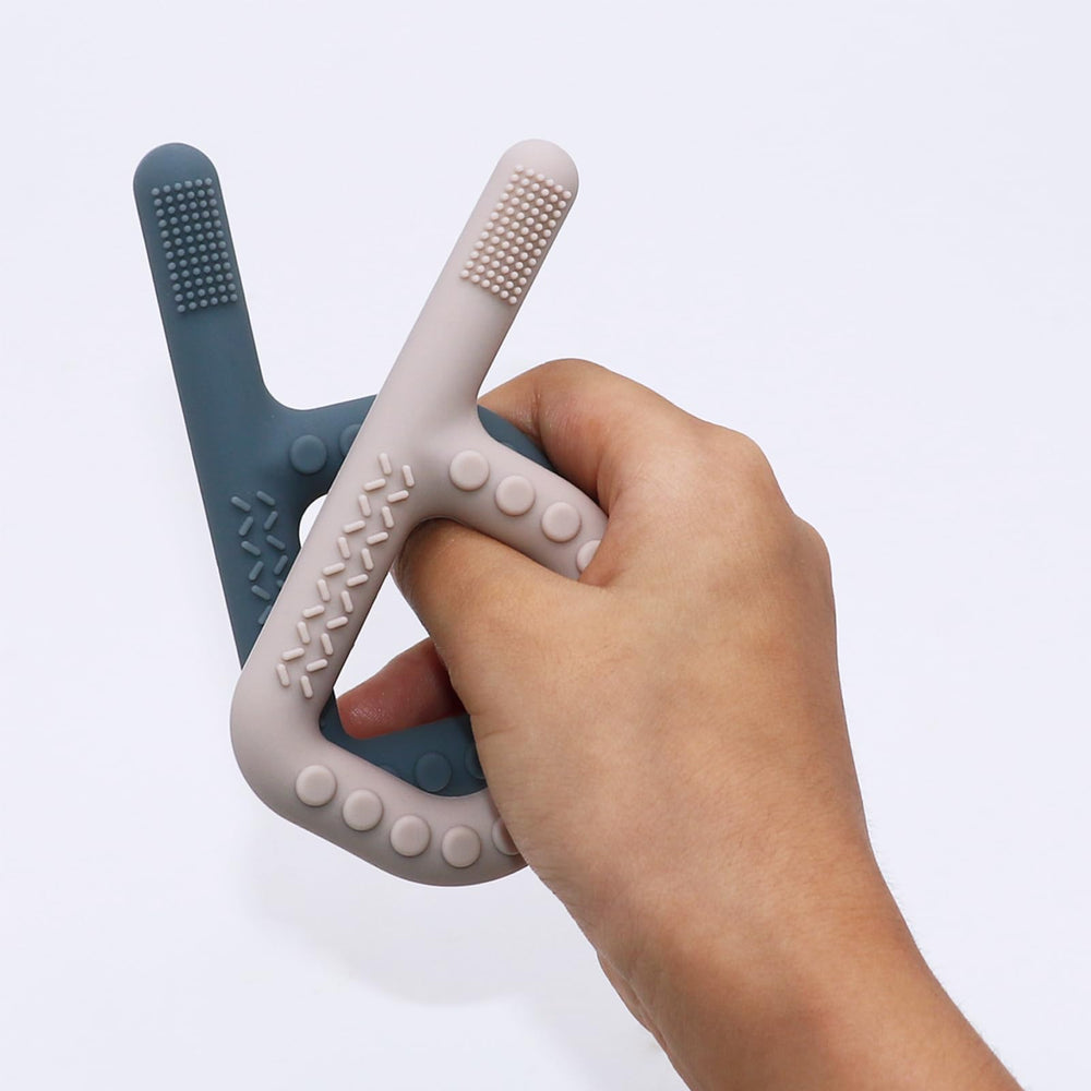 Flyaway 4-pack sensory set; versatile teething solution for babies and beyond.