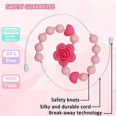 Flyaway chew necklace for child wearing sensory toy, supporting focus during activities.