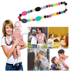Flyaway rainbow chew necklace close-up highlights easy-clean, dishwasher-safe material.