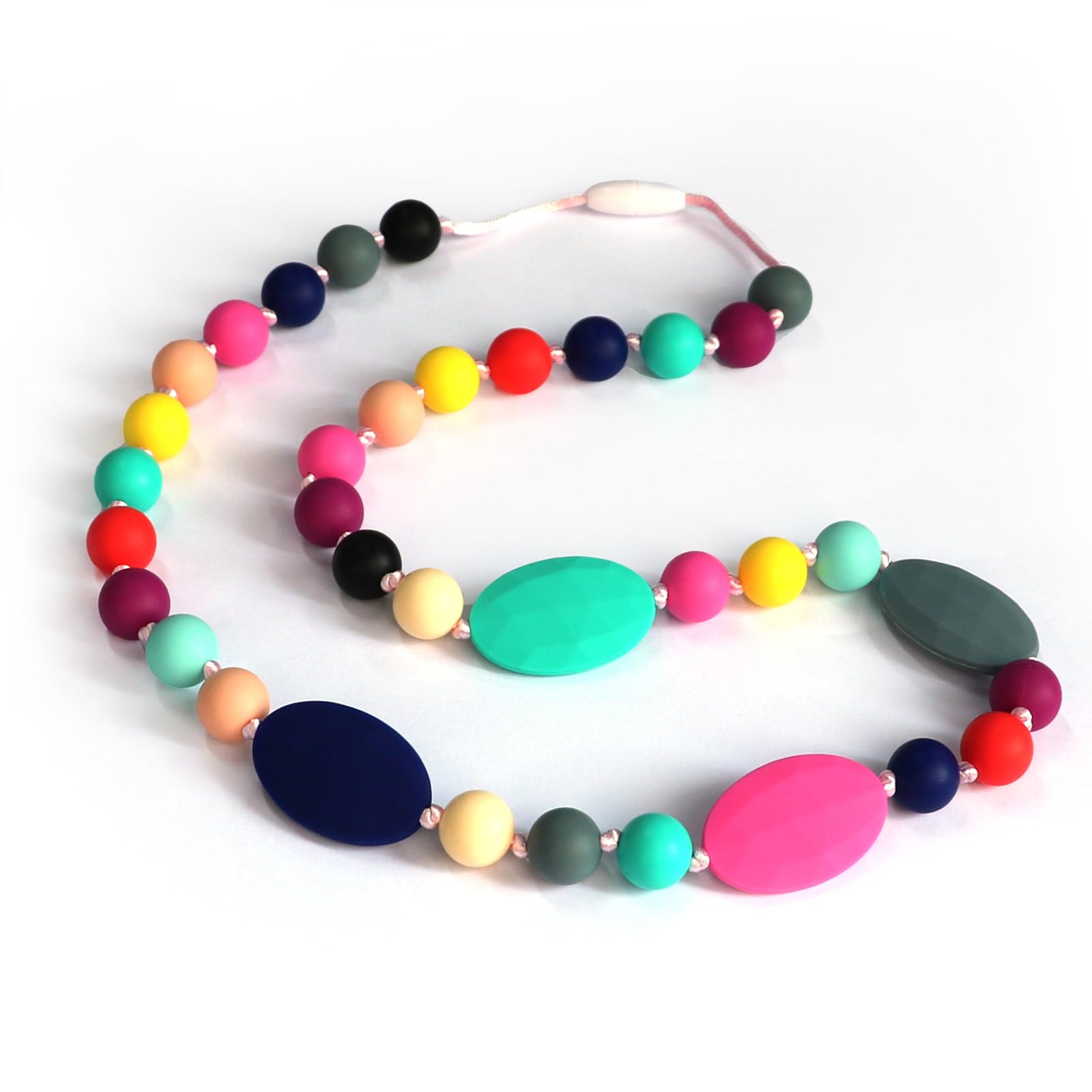 Flyaway silicone chew necklace close-up shows safe, food-grade material for sensory exploration.