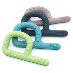 Flyaway texture-surface teether with three textures to calm gums.