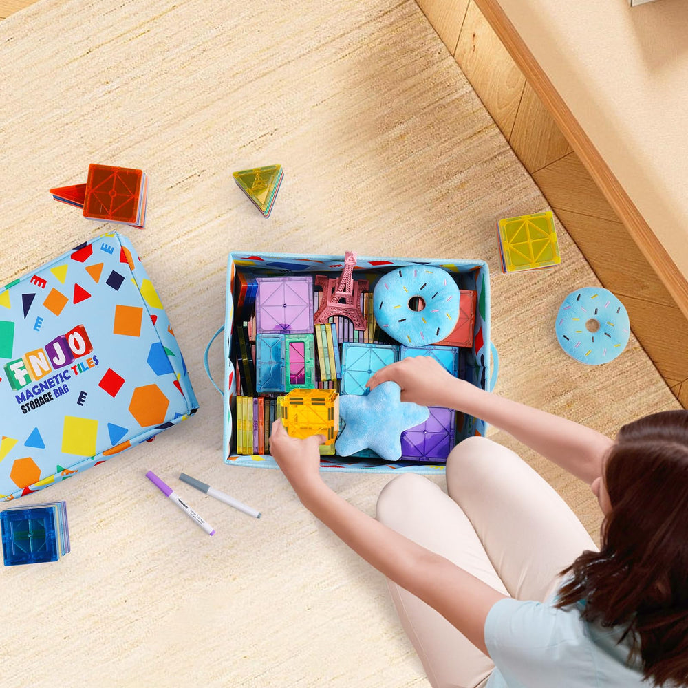 FNJO toy storage bin open interior shows easy access to tiles and blocks.