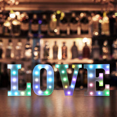 Foaky marquee letters spelling Welcome create a warm event ambience