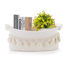 Followarm small basket with tassels showcases boho storage for gifts and trinkets.