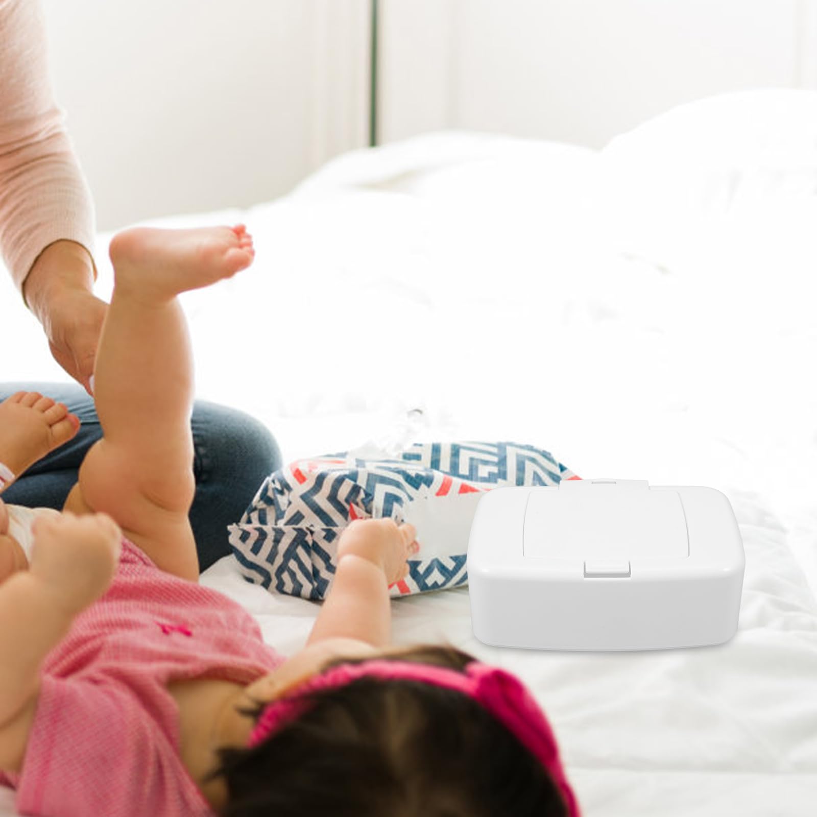 Fondotin wipes container fits diaper bags and stroller travel.