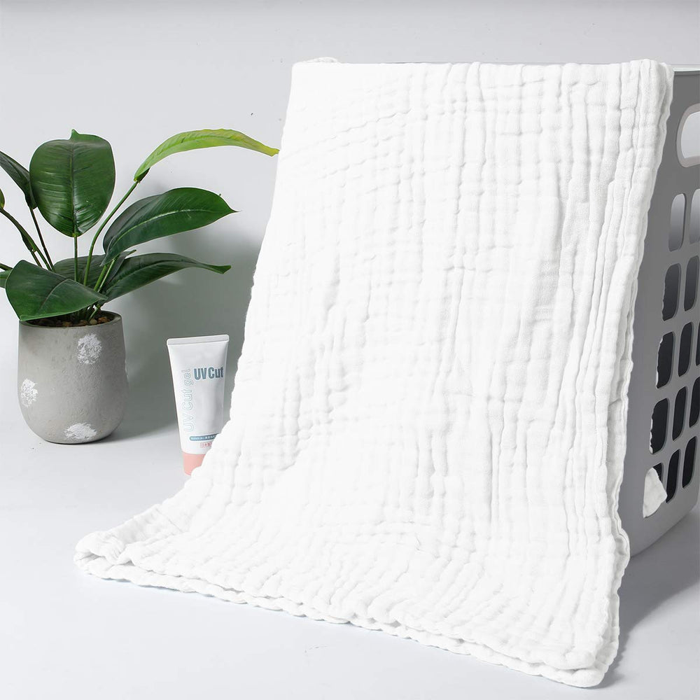 FOOK FISH muslin towel doubles as swaddle or stroller blanket.