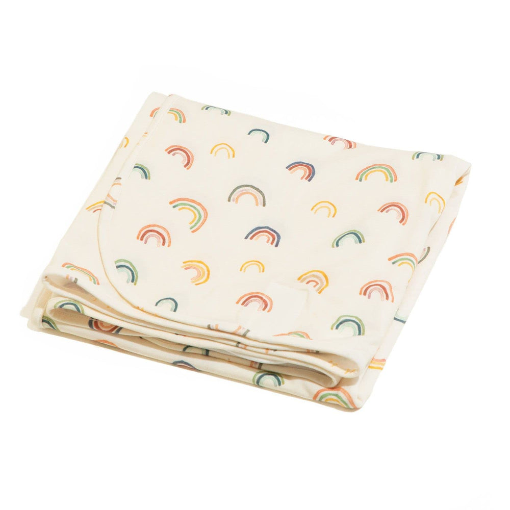Freshly Picked swaddle blanket wrapped on baby, cozy fit promotes secure, relaxed sleep