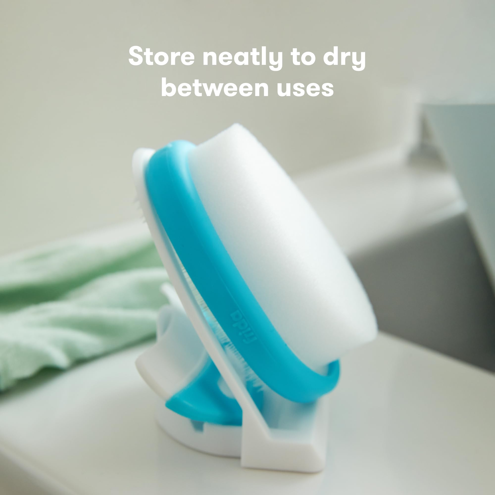 Frida Baby FlakeFixer kit open shows all-in-one cradle cap system.
