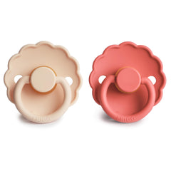 FRIGG Daisy outward-curve pacifier in pink cream supports comfortable skin contact.