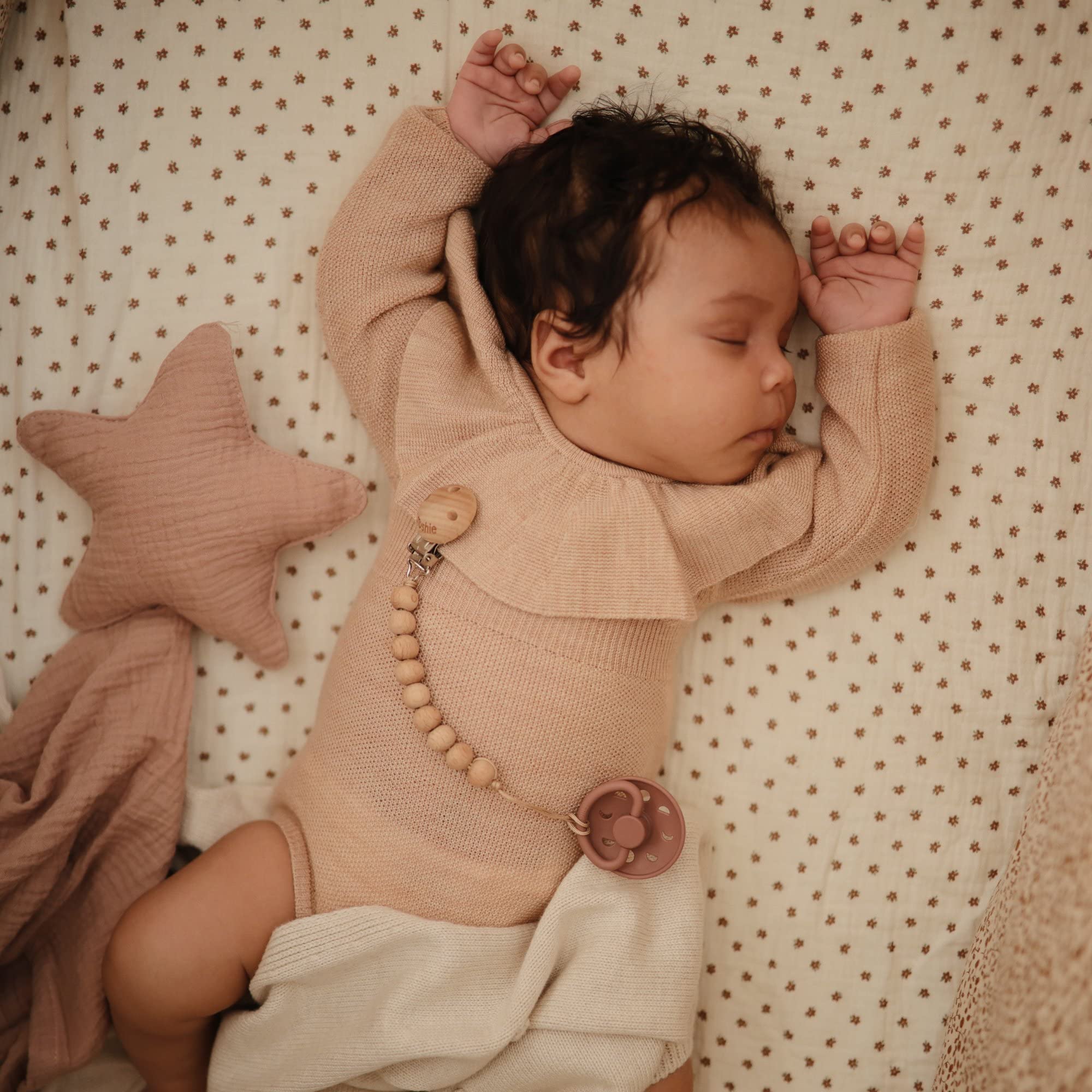 FRIGG Moon pacifier ergonomic curve supports gentle use