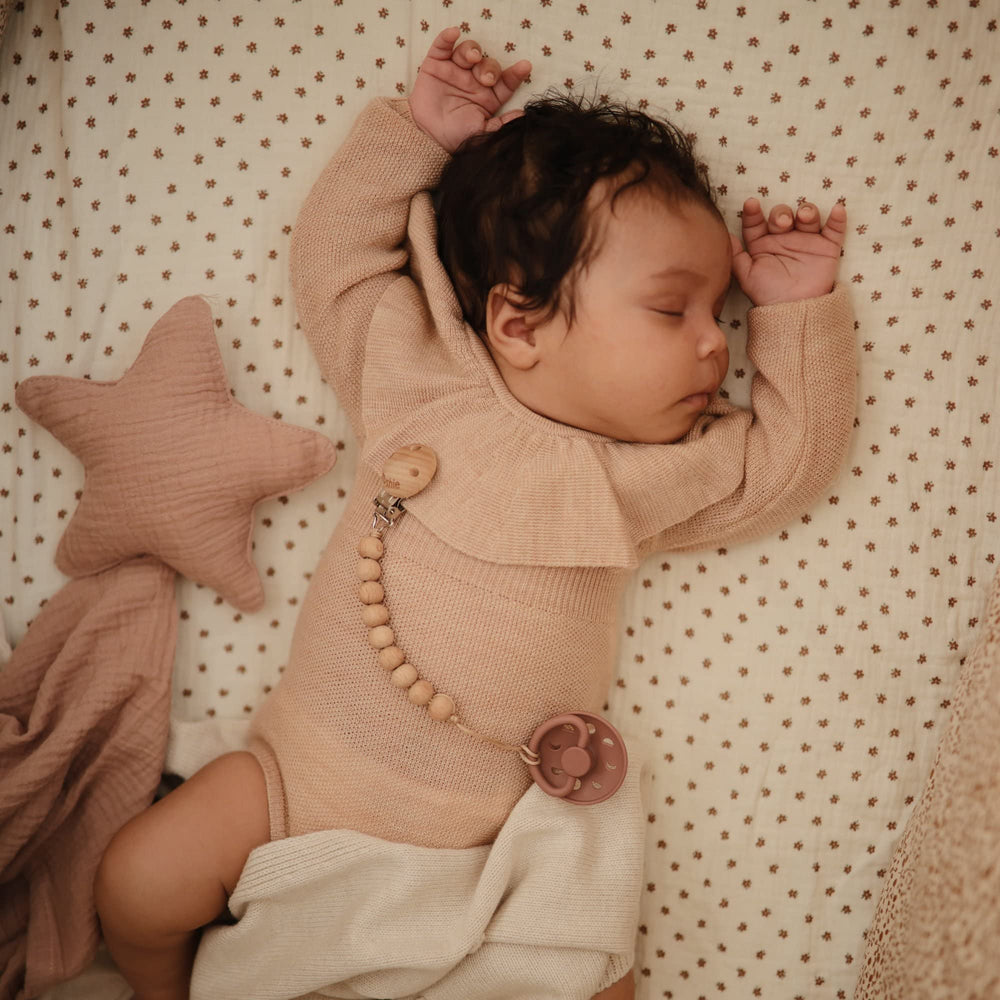 FRIGG Moon pacifier ergonomic curve supports gentle use