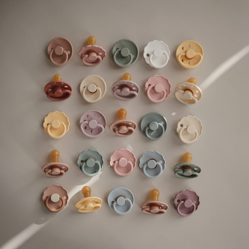 FRIGG rope pacifier shows air holes for breathability and skin comfort