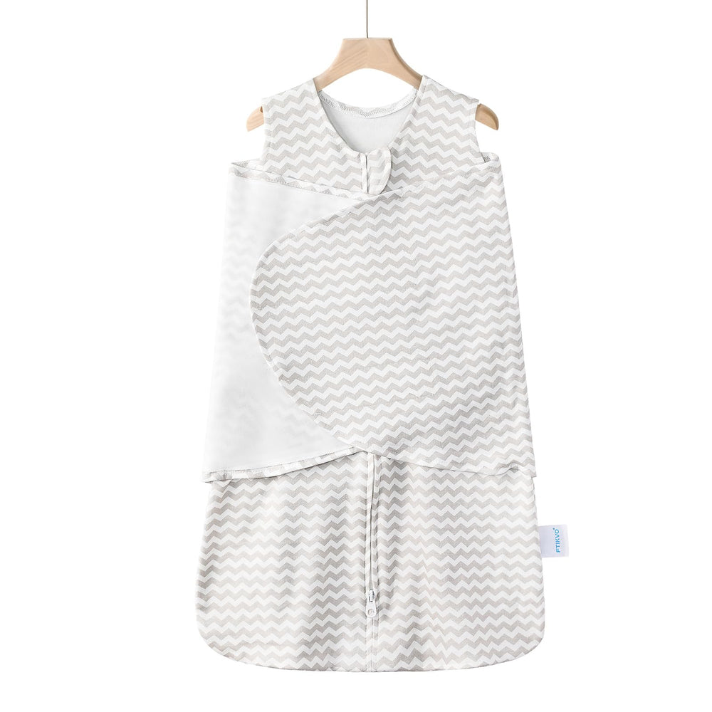 Ftikvo swaddle blanket in gray stripes provides snug security for sleep.