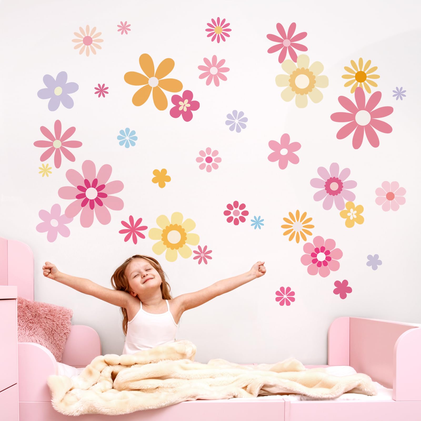 FUFUQUARE daisy flower wall decals in mixed sizes for playful bedrooms.
