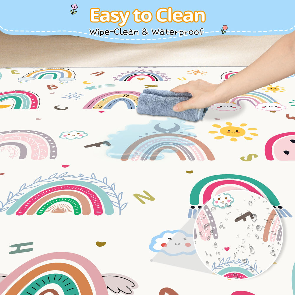 Baby crawling on a FUGWU rainbow play mat during floor play