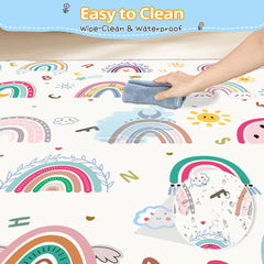 Baby crawling on a FUGWU rainbow play mat during floor play