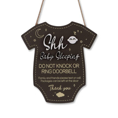 Fukaisu baby sleeping sign on the front door signaling quiet time for restful naps.